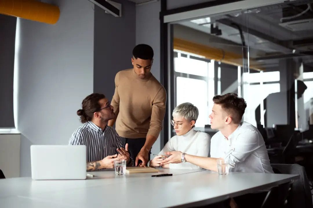 Team meeting in modern office setting.