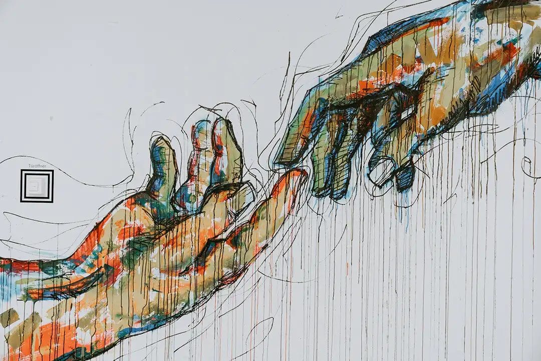 Abstract painting of two hands reaching out