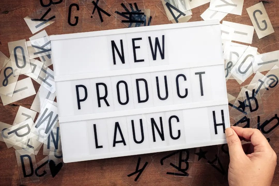 Sign reading 'New Product Launch' with letters.