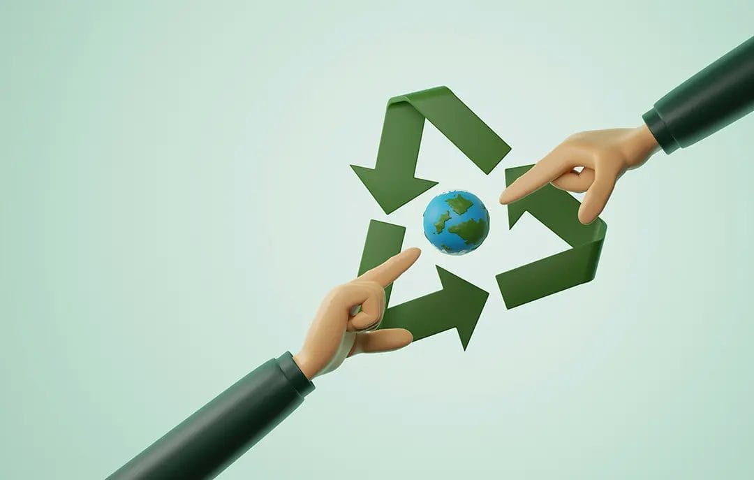 Hands around a recycling symbol and Earth.