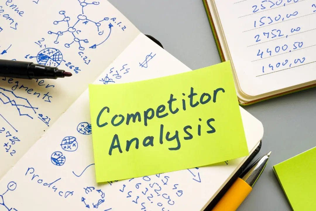 Competitor analysis notes and sketches on paper