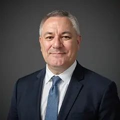 Smiling businessman in suit and tie portrait