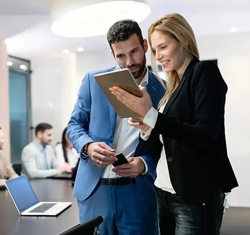 Business meeting with professionals discussing work.