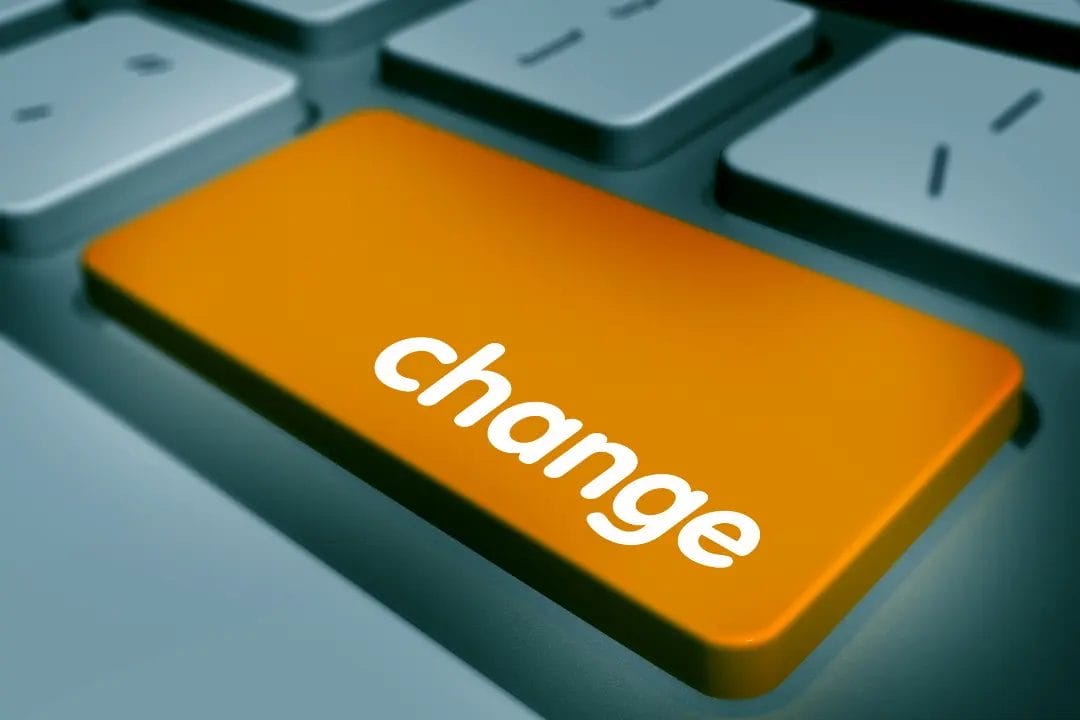 Keyboard with orange change button.