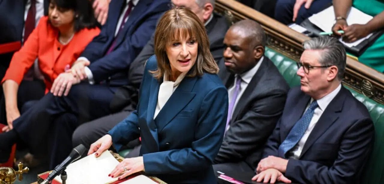 Politician speaking in UK Parliament session.